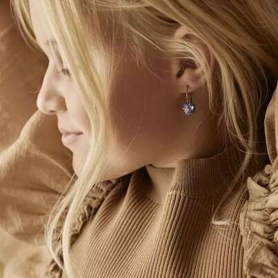 Sie sehen eine Packung Blomdahl Ohrringe Herz lila, Produktbild: 02 Blomdahl Ohrringe Herz lila, A-Nr.: 6019957 - 02